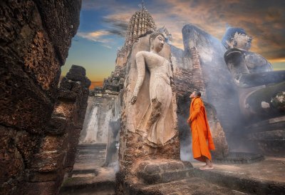 buddhist-monk-and-statue.jpg