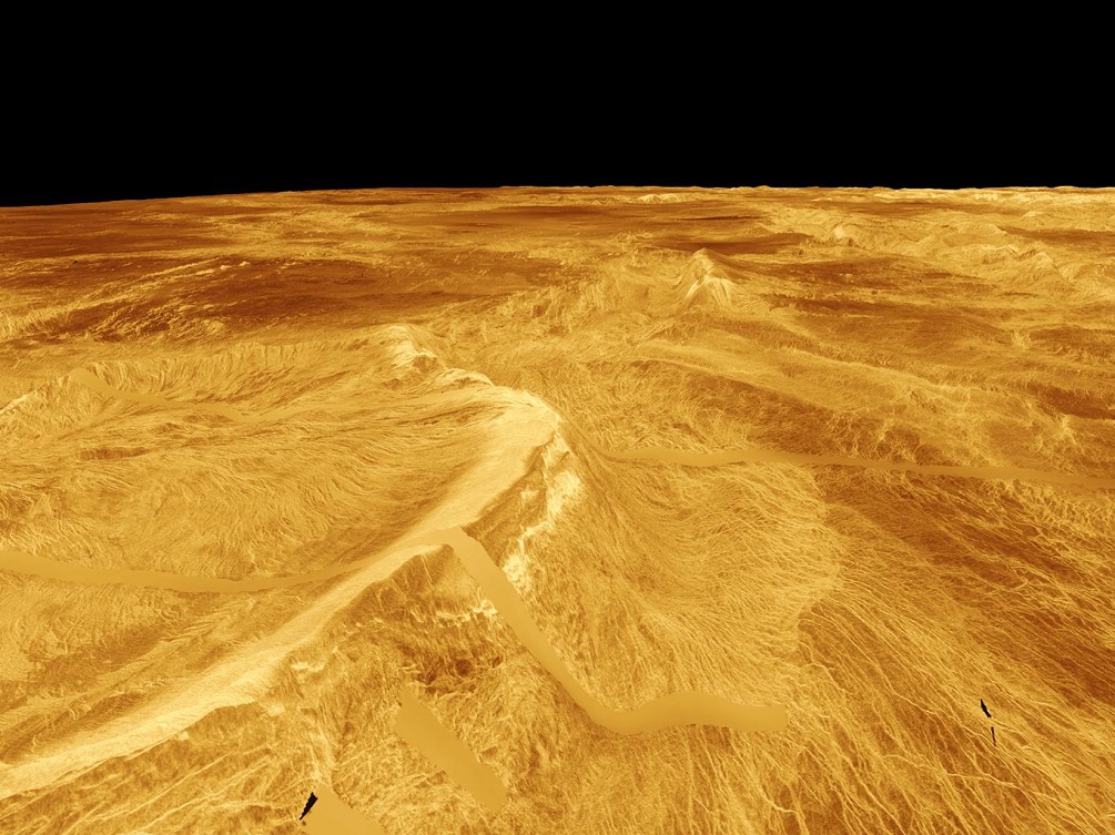 Povrch Venuše má teplotu téměř 500 °C. Tady asi žádný život čekat nemůžeme.
